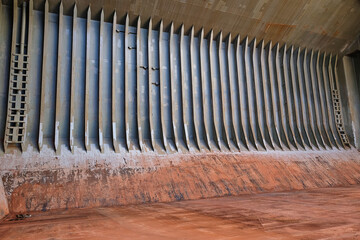 View of cargo hold's side with framing and hopper plating of bulk carrier just after discharging of...