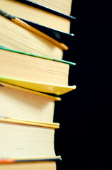Stack of books. Selective focus, close-up.