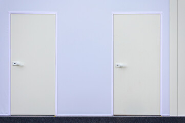 Photo of two white door concept on white background