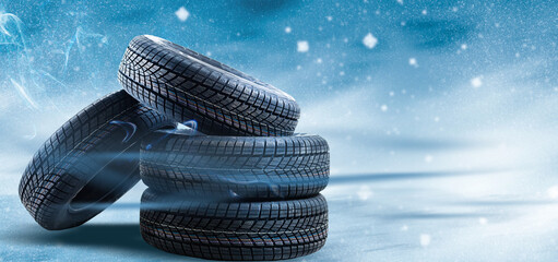 winter tyre cover on Lights on blue and snow background