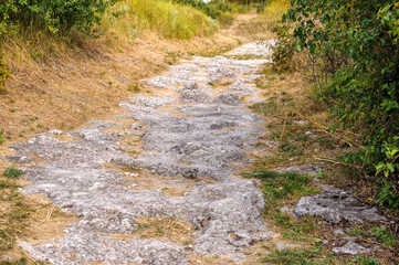 Stony path in the medieval cave town of Chufut-Kale. Crimea.