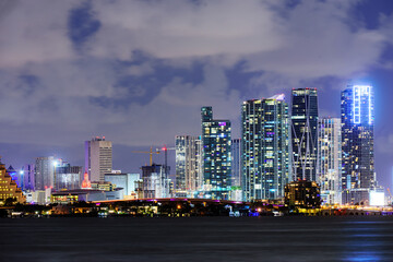 Fototapeta na wymiar Miami night. Miami business district, lights and reflections of the city lights.