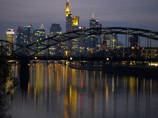 Fototapeta premium Colorful sunset over downtown Frankfurt and the river Main