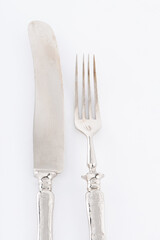 silver fork an knife on a white background