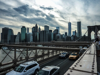 Brooklyn Bridge with traffic in downtown Manhattan New York City