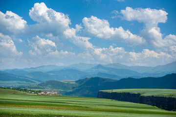 Rural landscape with field, canyon  and mountains, Armenia