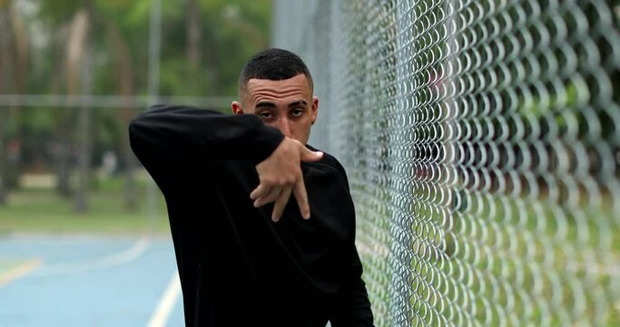 Hispanic man dancing outside. Latin man freestyle dance