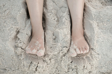 Woman sitting on the beach