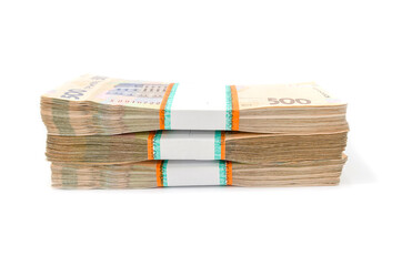 three bundles of hryvnia on a white background. Ukrainian money with a face value of 500 hryvnia.