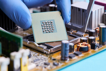 close up view for cpu or central processor chip over circuit board background. electronic industry conceptual. studio shot