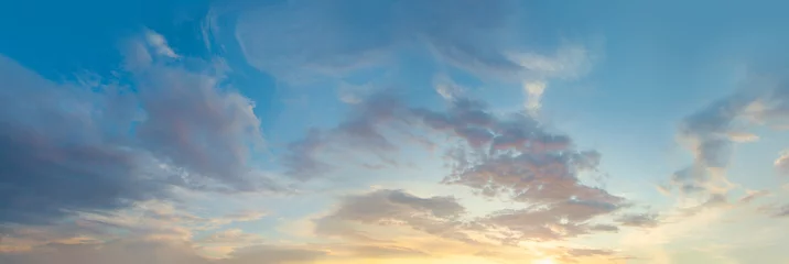  Sunset sky panorama. Blue sky with clouds and sun, beautiful landscape panorama skyline background © millaf