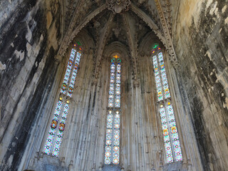 Alcobaça / Portugal - September 11, 2020: Manueline carvings on window alcove of Capelas Imperfeitas of Batalha Monastery near Leiria in Portugal.