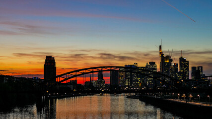 Frankfurt on Main Germany view over the Main river to the skyline of financial district in the evening