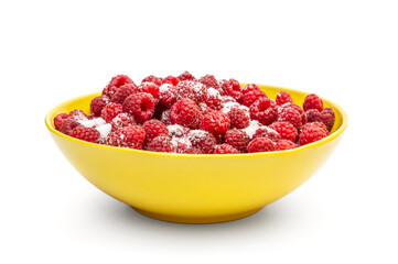 Fresh raspberry with sugar in yellow bowl. Isolated on white.