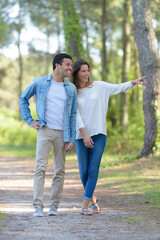 a romantic couple in the forest