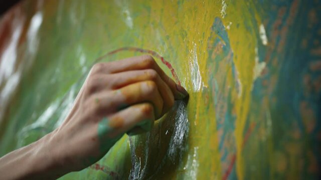 Artist's Hand. Girl Paints Picture With Her Hand.