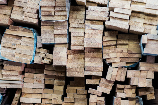 Various wood planks piled in a stack