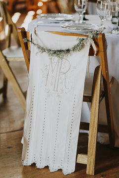 Decorated Wedding Reception Chair in Barn Reception Venue