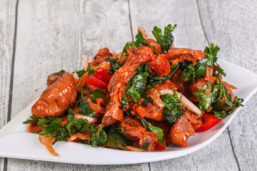 Marinated chicken breast slices with cilantro
