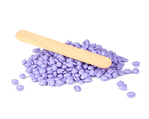 Aromatherapy violet lavender wax drops for depilation isolated on the white