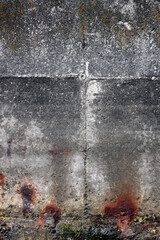 Obraz premium Abstract shot of cement shoreline wall with cracks and colored patches for background