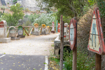 Old wooden traffic signs exposed in La Cerradura de Pegalajar (Jaén-Spain)