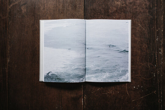 full spread image of ocean in photo book
