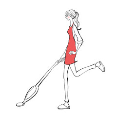 リビングで掃除機をかける女性