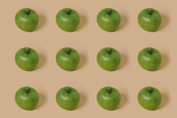 Trendy pattern made with fresh apple fruit on pastel beige background. Minimal concept.