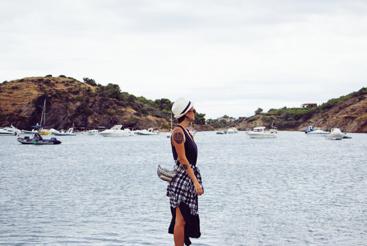Woman tourist looking at the sea