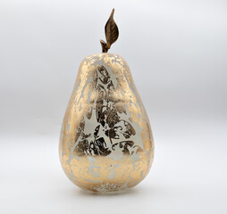 Beautiful golden pear with the white background