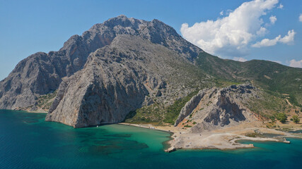 Fototapeta premium Aerial drone photo of tropical exotic bay with emerald sea and rocky seascape