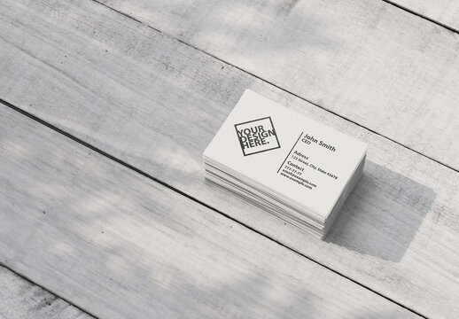 Stack of Business Card Mockup on Wooden Table Outdoors