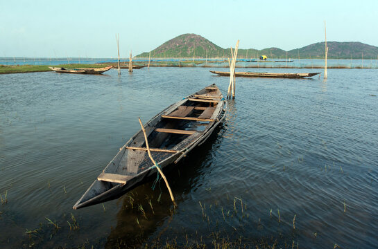 Fishing boat resting in a big lake,India