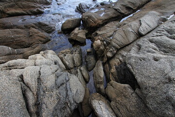 Seashore, big rocks on the seashore