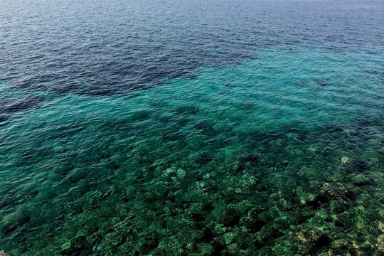 Three shades of blue sea surrounding Hvar island in Croatia