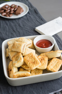 party pies and sausage rolls on a table at a party