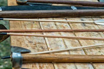 wooden arrows among the weapons of the middle ages. Selective focus