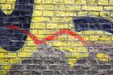 Graffiti on brick wall