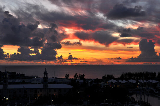Dramatic colorful sunset sky wit beautiful cloud formation over Bermuda, Atlantic Ocean.