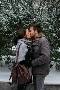 Couple Kissing on the Snow
