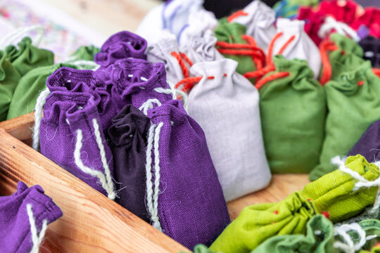 set of canvas bag with aromatherapy from medicinal herbs, lilac and green sachets