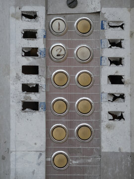 Grungy old apartment buzzers