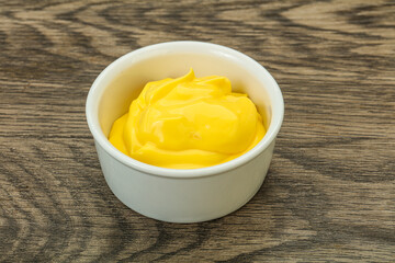 Natural cheese sauce in the bowl