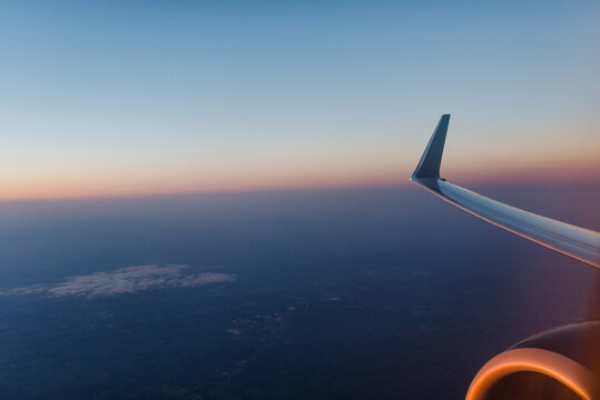 The view of sunset from an airplane