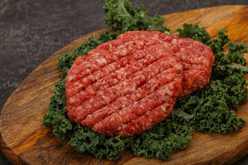 Raw beef burger cutlet for cooking