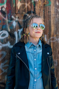 Stylish Little Girl with Aviator Sunglasses