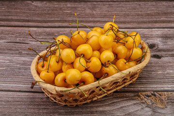 Sweet ripe yellow cherry heap
