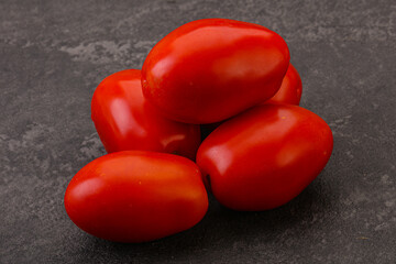 Red bright tasty tomato heap