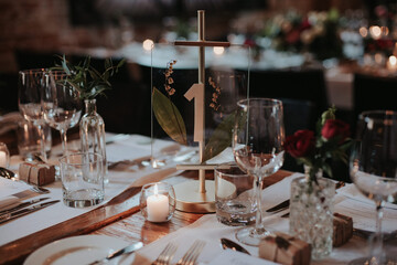 Dark and romantic candle lit dinner autumn wedding inspiration